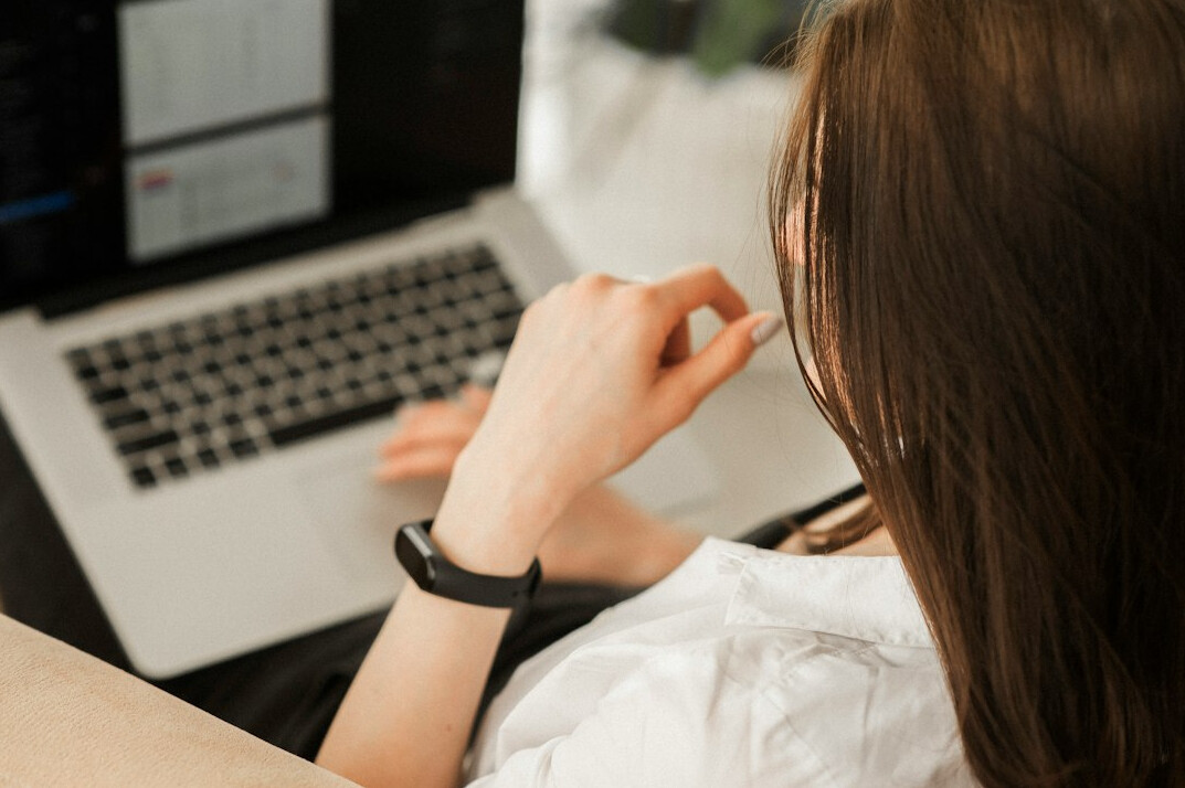 woman solving coding problem