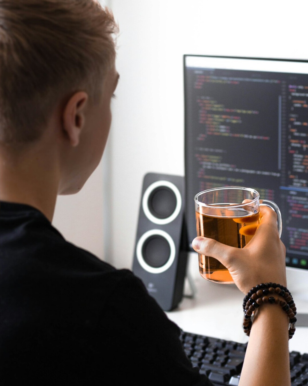 person celebrating coding achievement